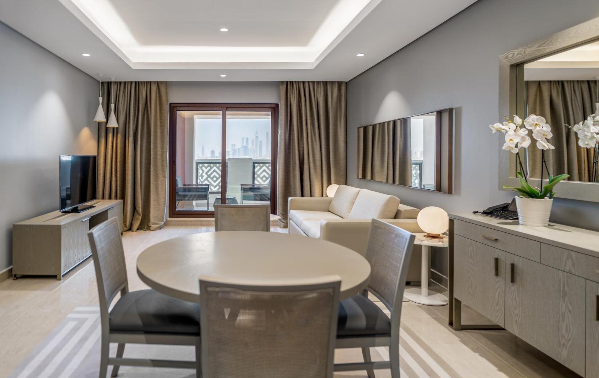 Two-Bedroom Family Apartment with Skyline View and Private Beach Access