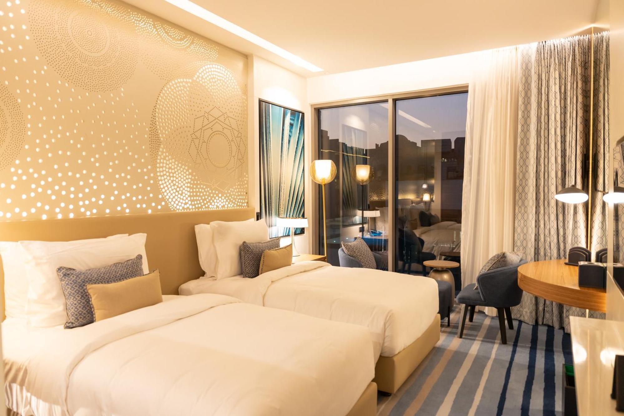 Twin Deluxe Room with Balcony and Partial Sea View