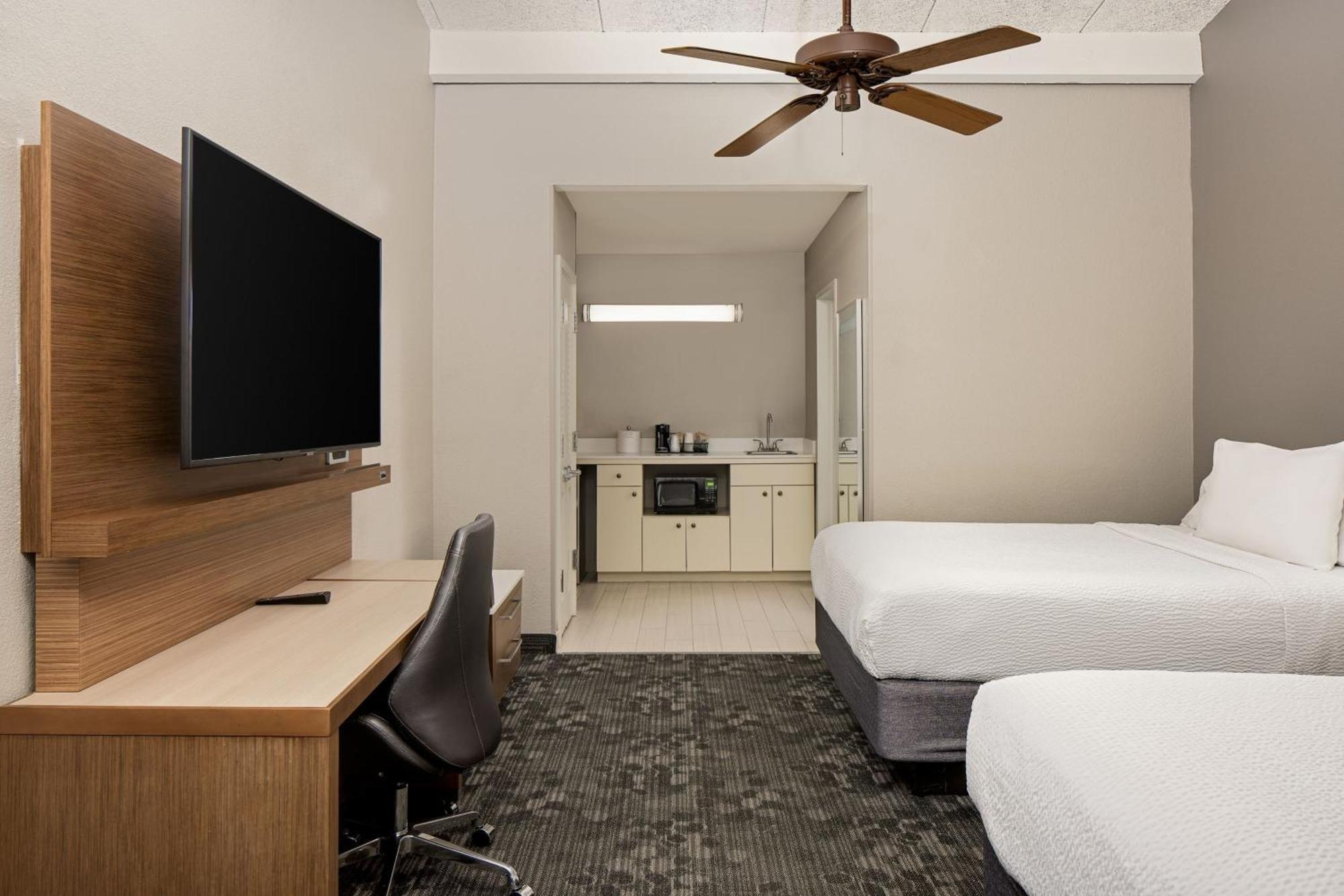 Two-Bedroom Room with Four Queen Beds, Balcony and Sofa Bed