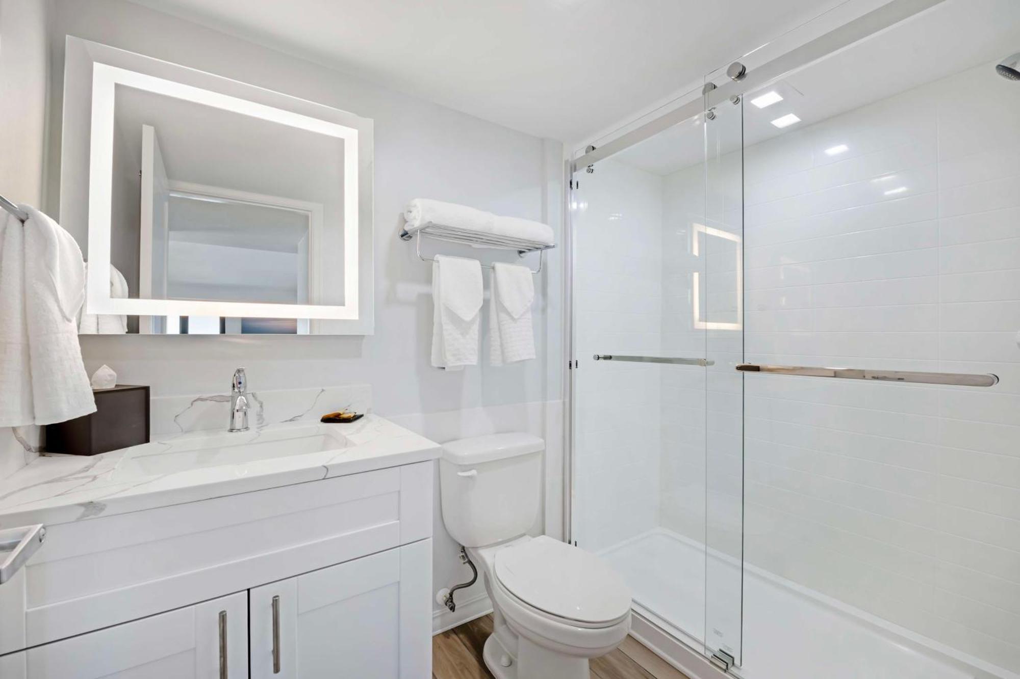 One-Bedroom Suite with One King and Two Double Beds with Sofa Bed, Balcony and Gulf View - Non-Smoking