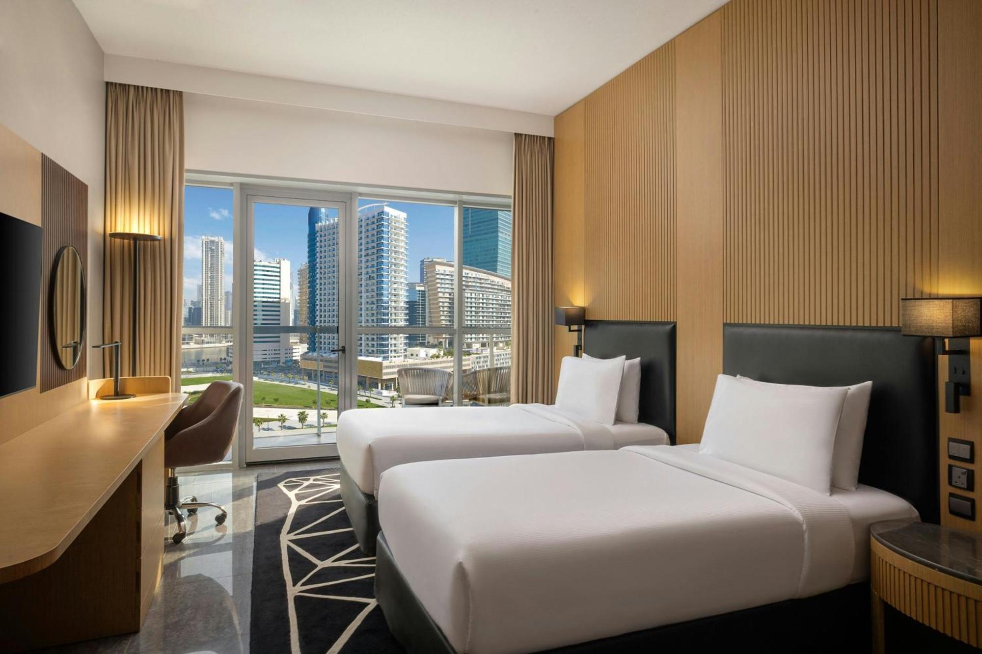 Deluxe Twin Room with Balcony and City View
