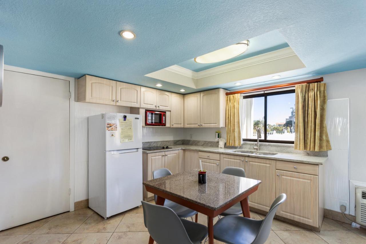 Deluxe One Bedroom Suite: 2 Queen Beds in Bedroom and 1 Sleeper Sofa